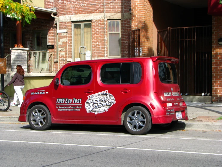 an automobile parked on the side of the street