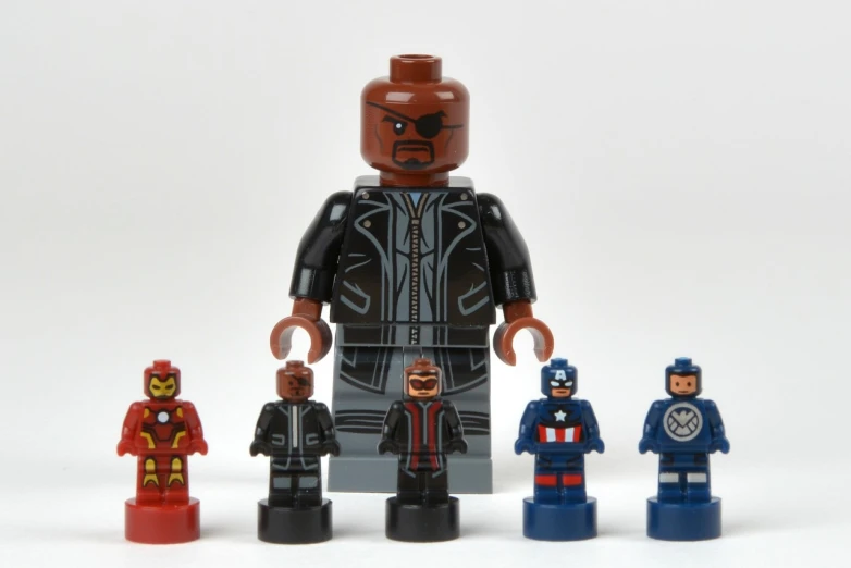 a group of lego figurines is standing together