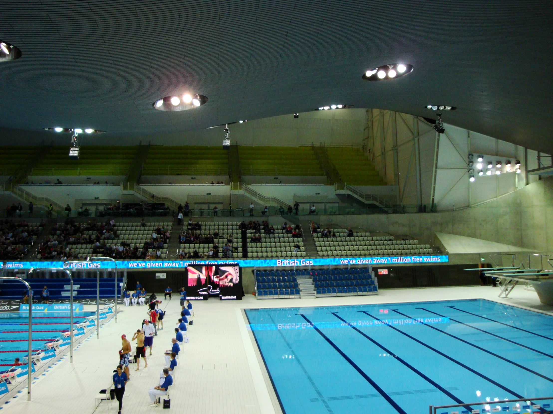 a pool with many people standing in it