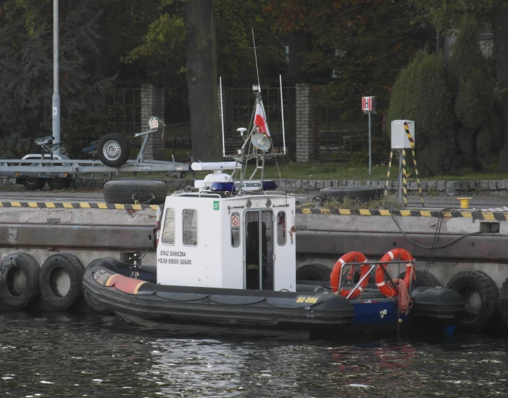 a tug boat parked on the dock