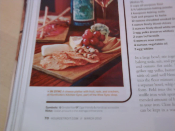 wine and cheese are served on a table