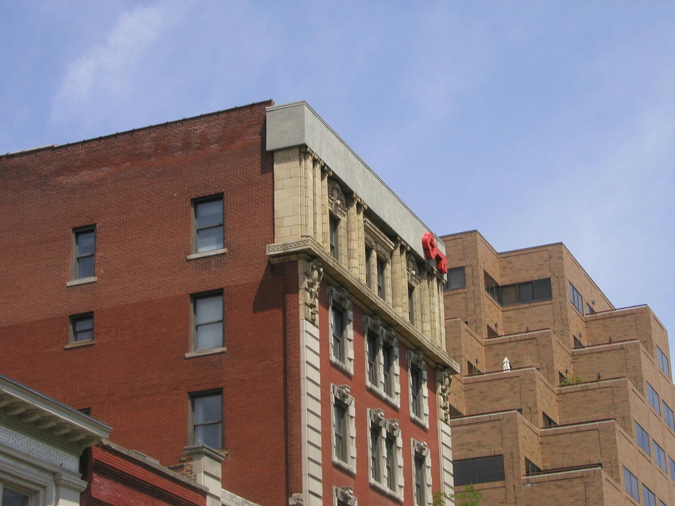 a building with several balconies on top of it