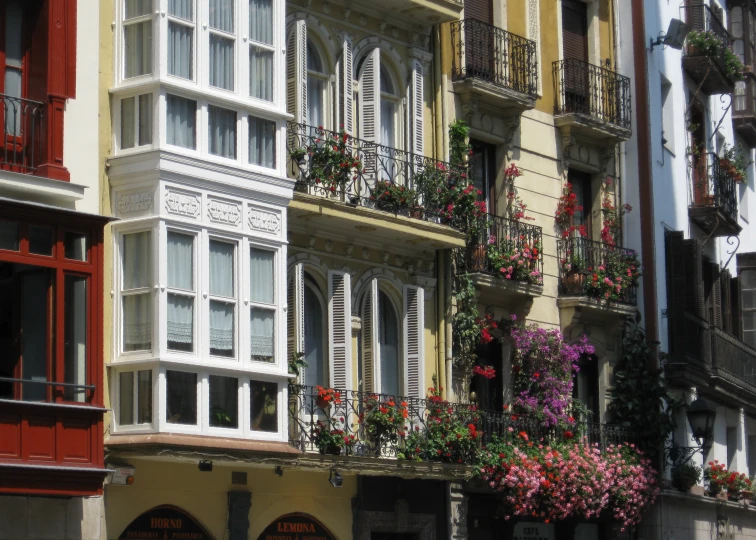 this is a row of houses with balconies
