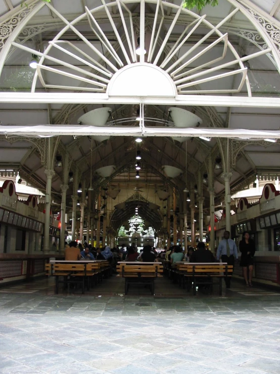 a room with people standing around the inside