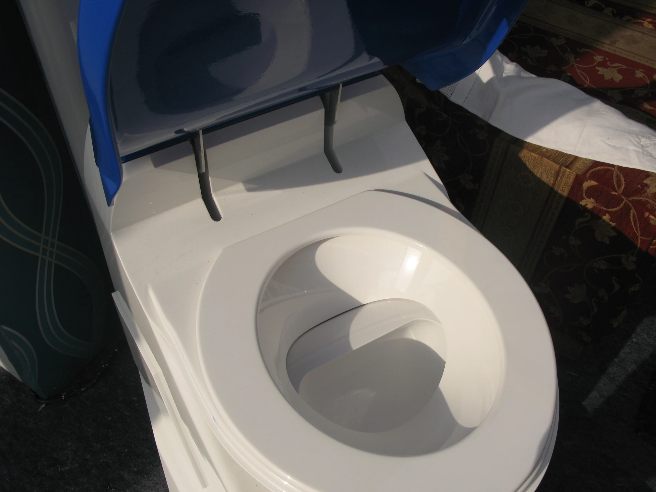 a white toilet that is sitting in a room
