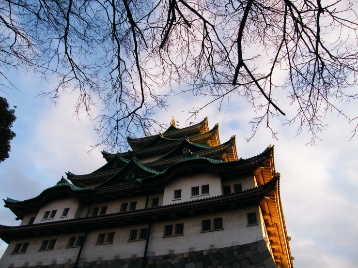 a tower is in the foreground with a cloudless sky behind it