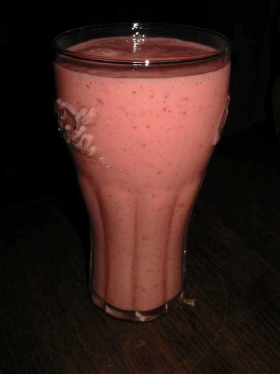 a smoothie in a glass filled with water