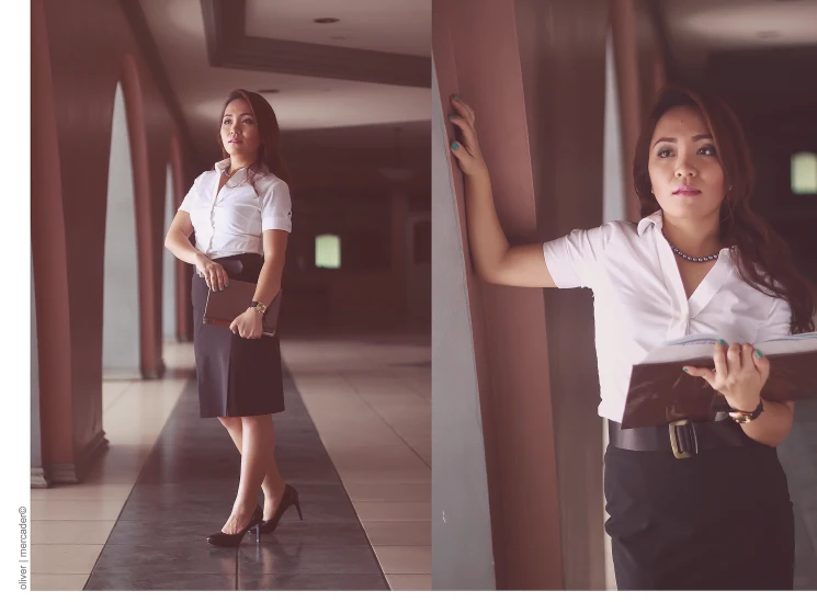 a woman in a business attire is looking at her phone