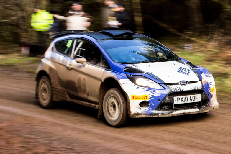 this is a subaruent rally car on the dirt