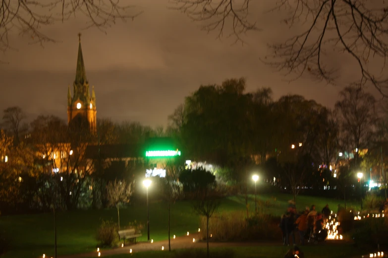 a park with a tall building on top of it