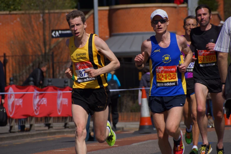 people are running in the streets during a marathon