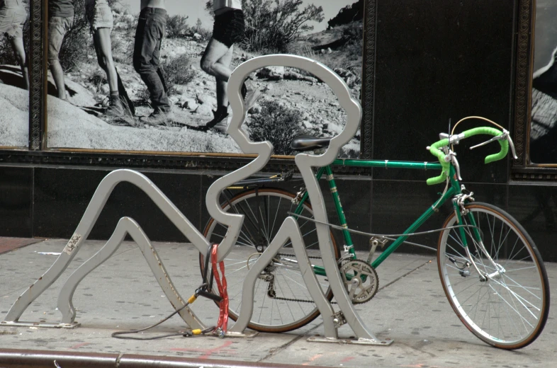 a close up of a bike on the sidewalk