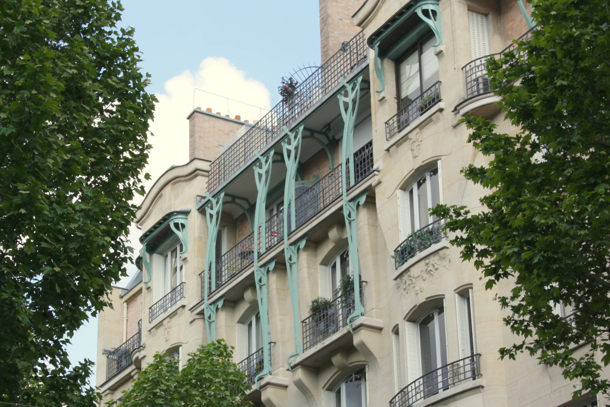 a building has many balconies on the balconies