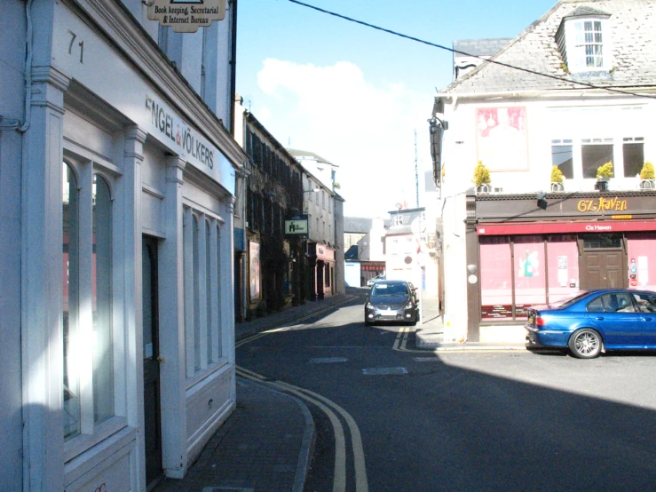 a road with some buildings on one side