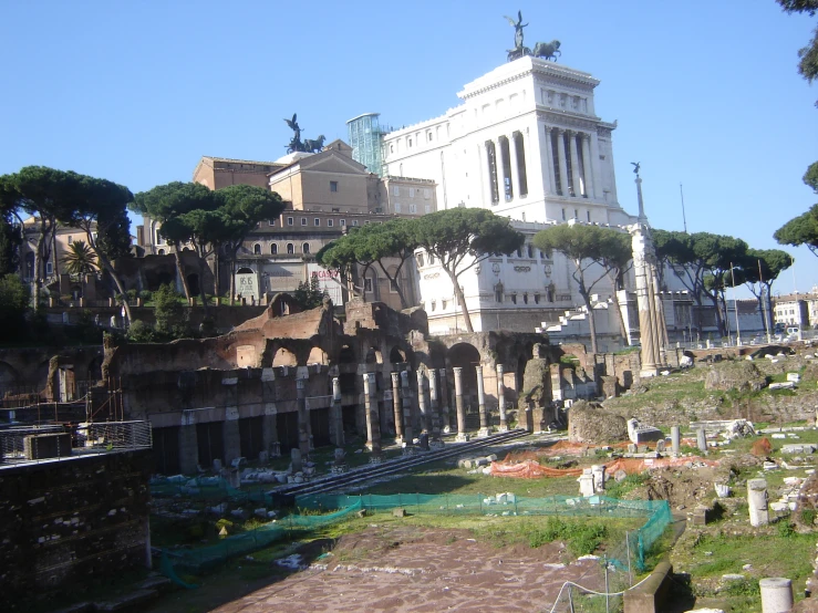 a cemetery in a city with some trees