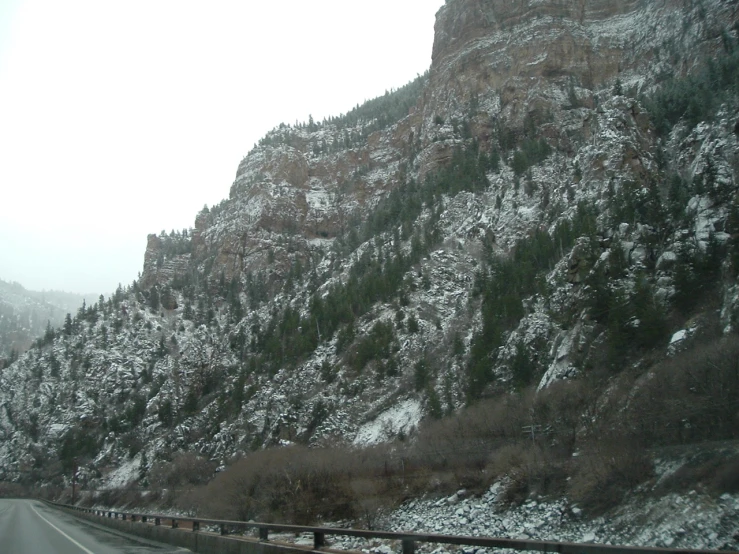 there are many large mountains with snow on them