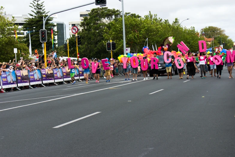 several people holding signs that read don't stop motion