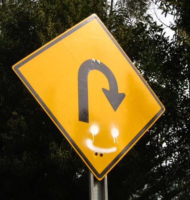 a street sign has a circle painted on it