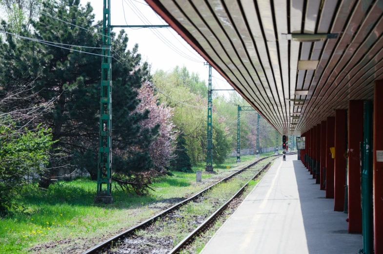 a railway station that looks empty of people