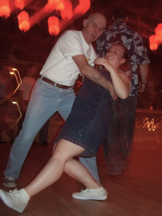 two people having fun on the dance floor