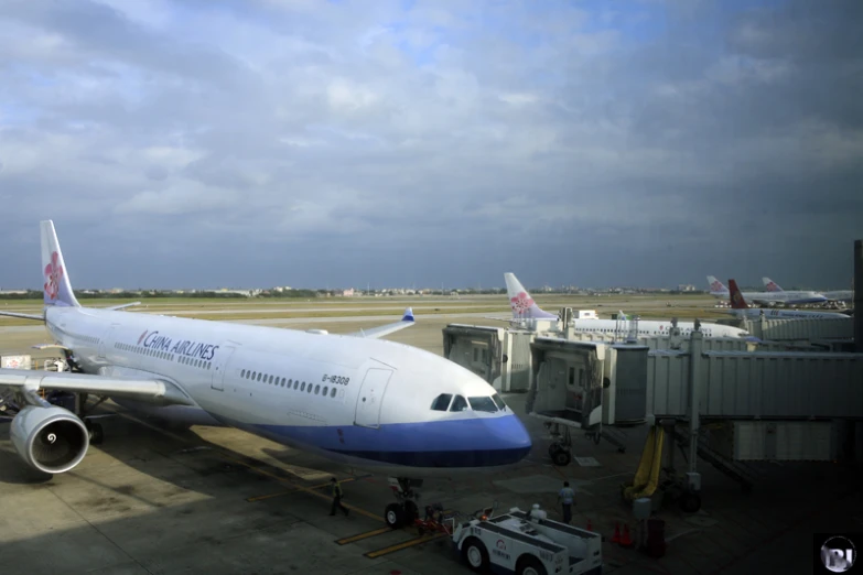 a big jet that is sitting on some concrete