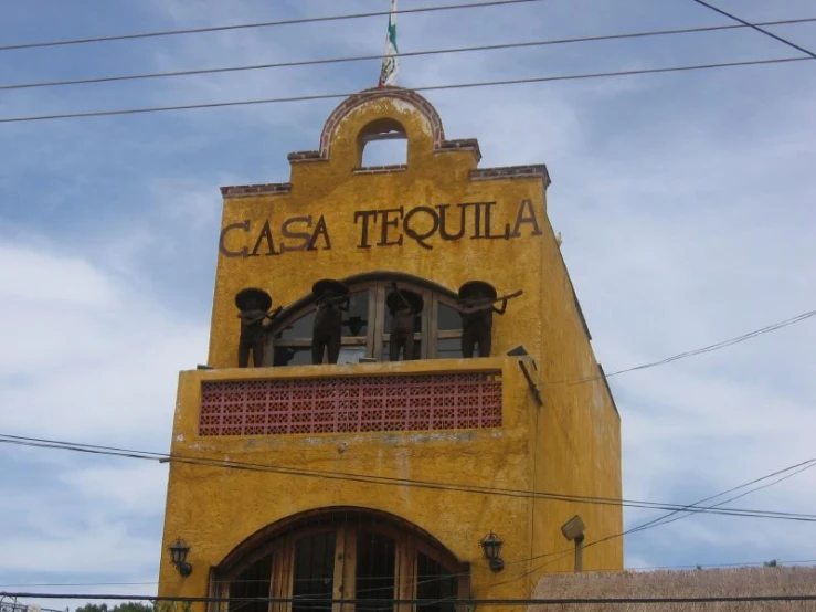 there is a tall building that says casa tequila