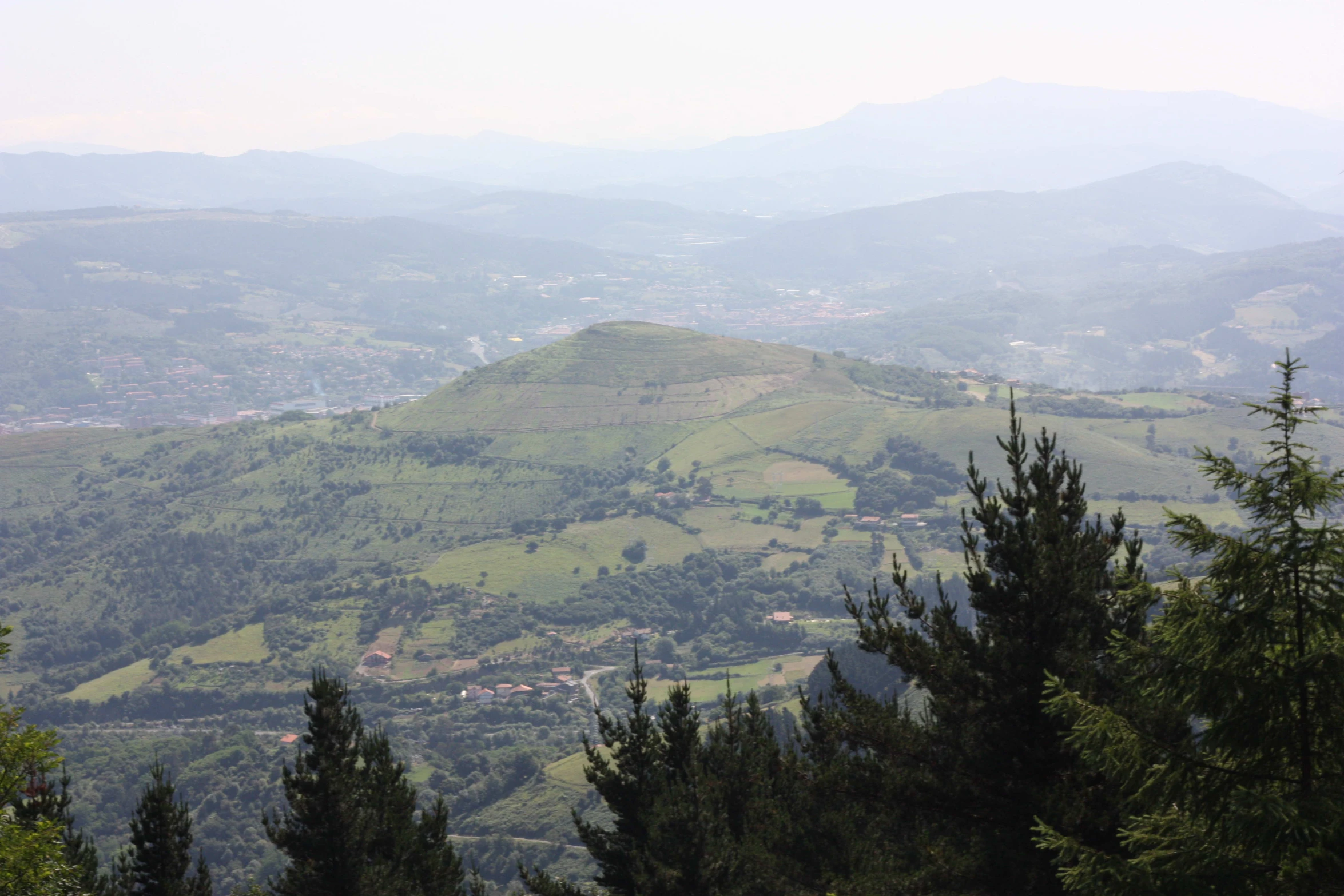 looking down at the countryside in the mountains