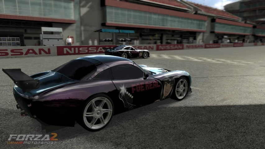 a purple car driving through a race track