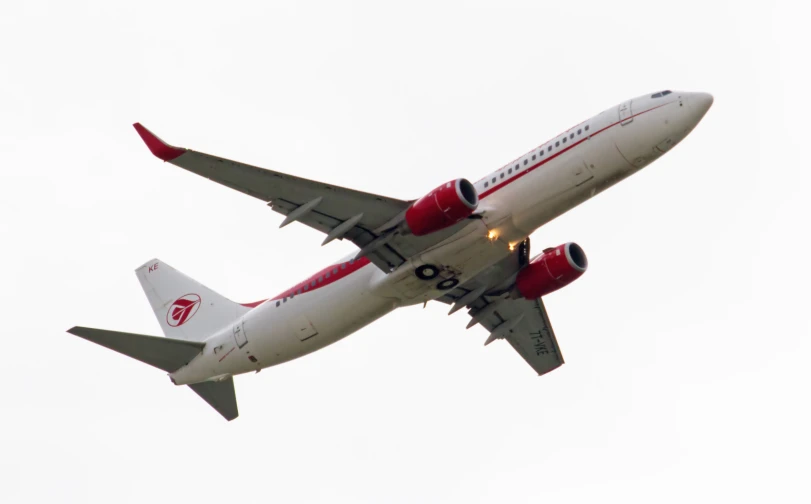 a large air plane flying through the sky