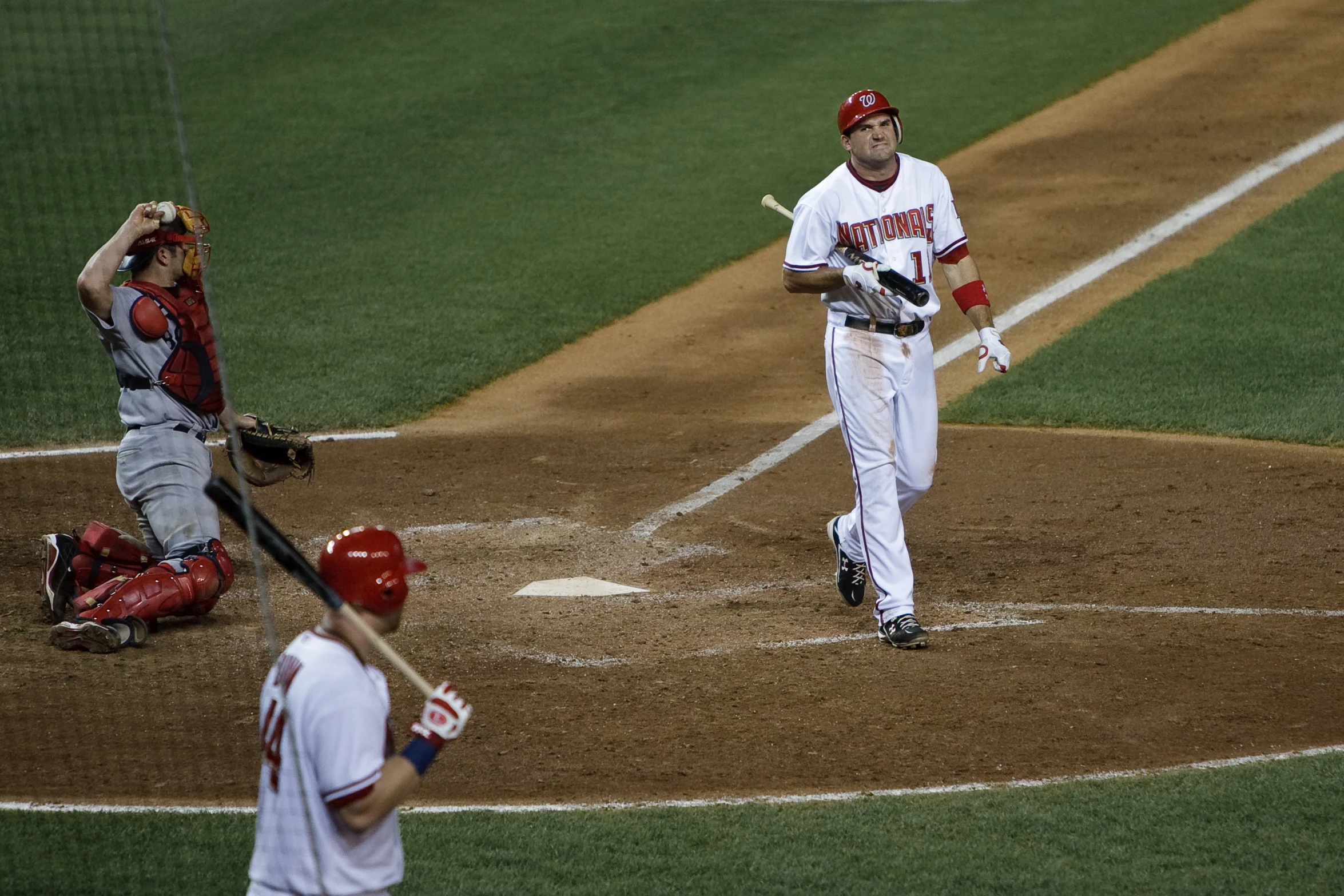 a baseball player that is running in the dirt