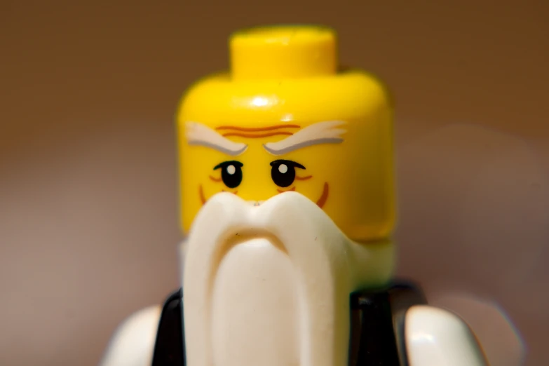 the head of a lego figure with a beard and mustache
