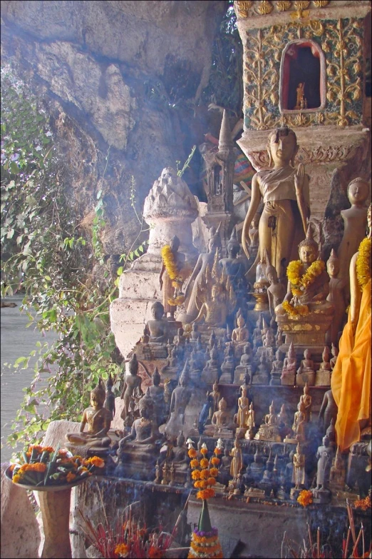 statues, pots and other items on a fountain