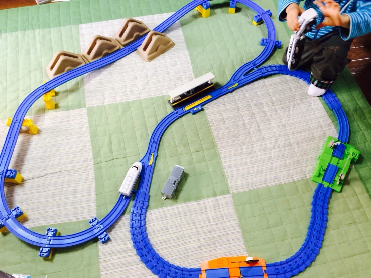 some play trains that are next to each other