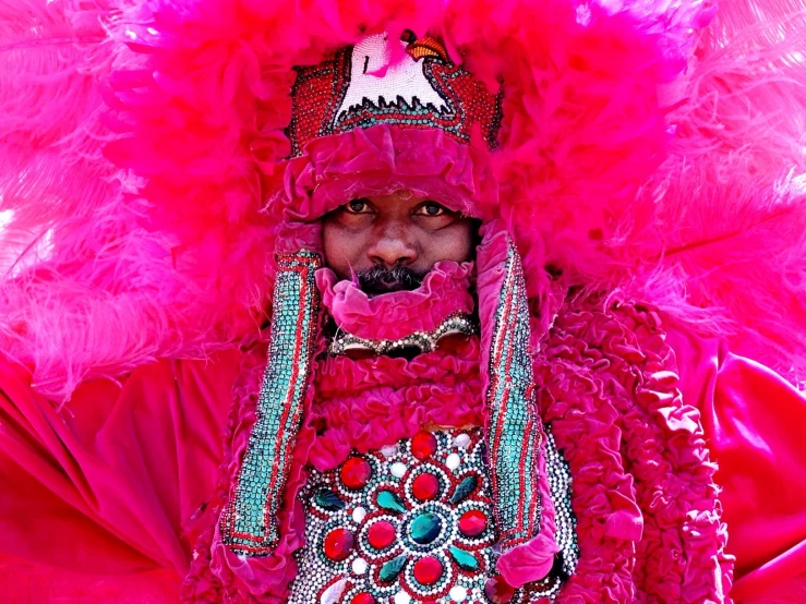 a close up of a person in costume with pink stuff