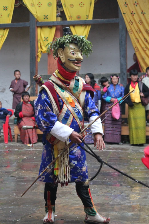 a man dressed in elaborately decorated clothing