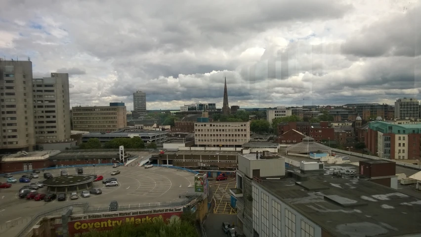 an overview of a city with an oval shaped building