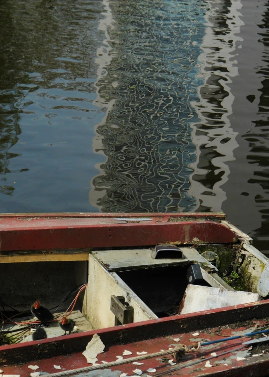 a view from above looking down on a boat on the water