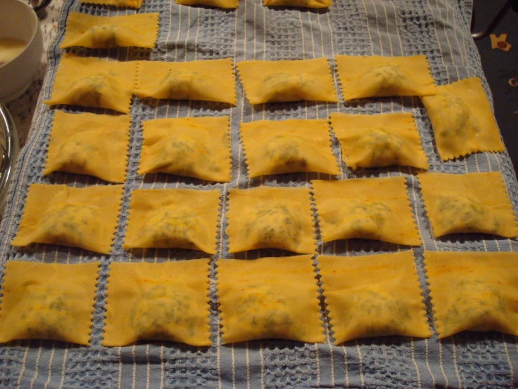 yellow pastry items on a gray table cloth