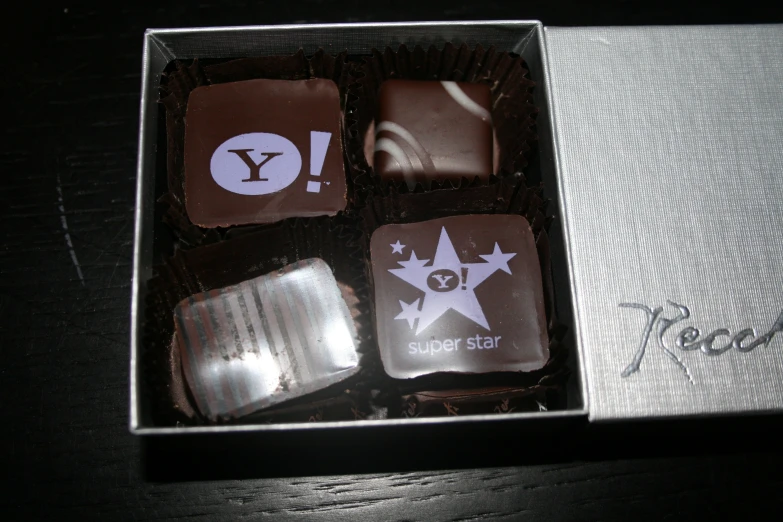 a box of fancy chocolates is pictured in this picture