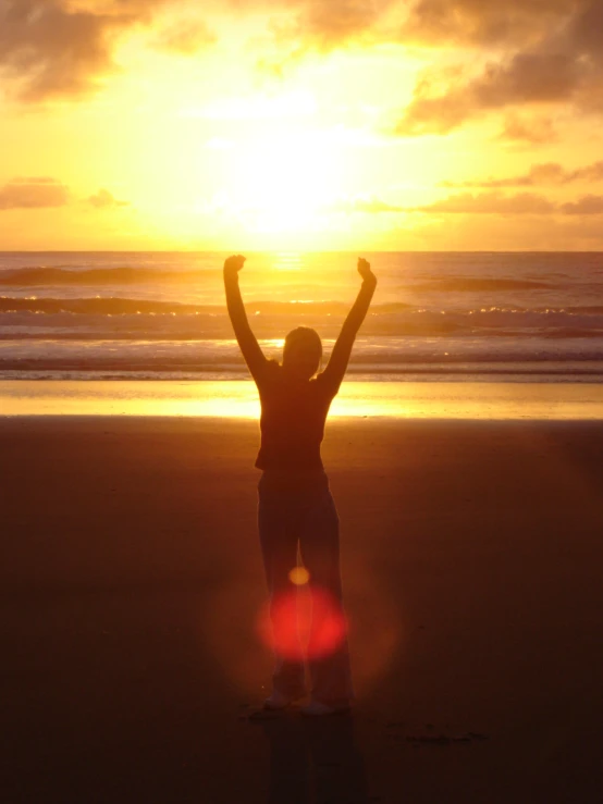 a person on a skateboard is in front of the sun