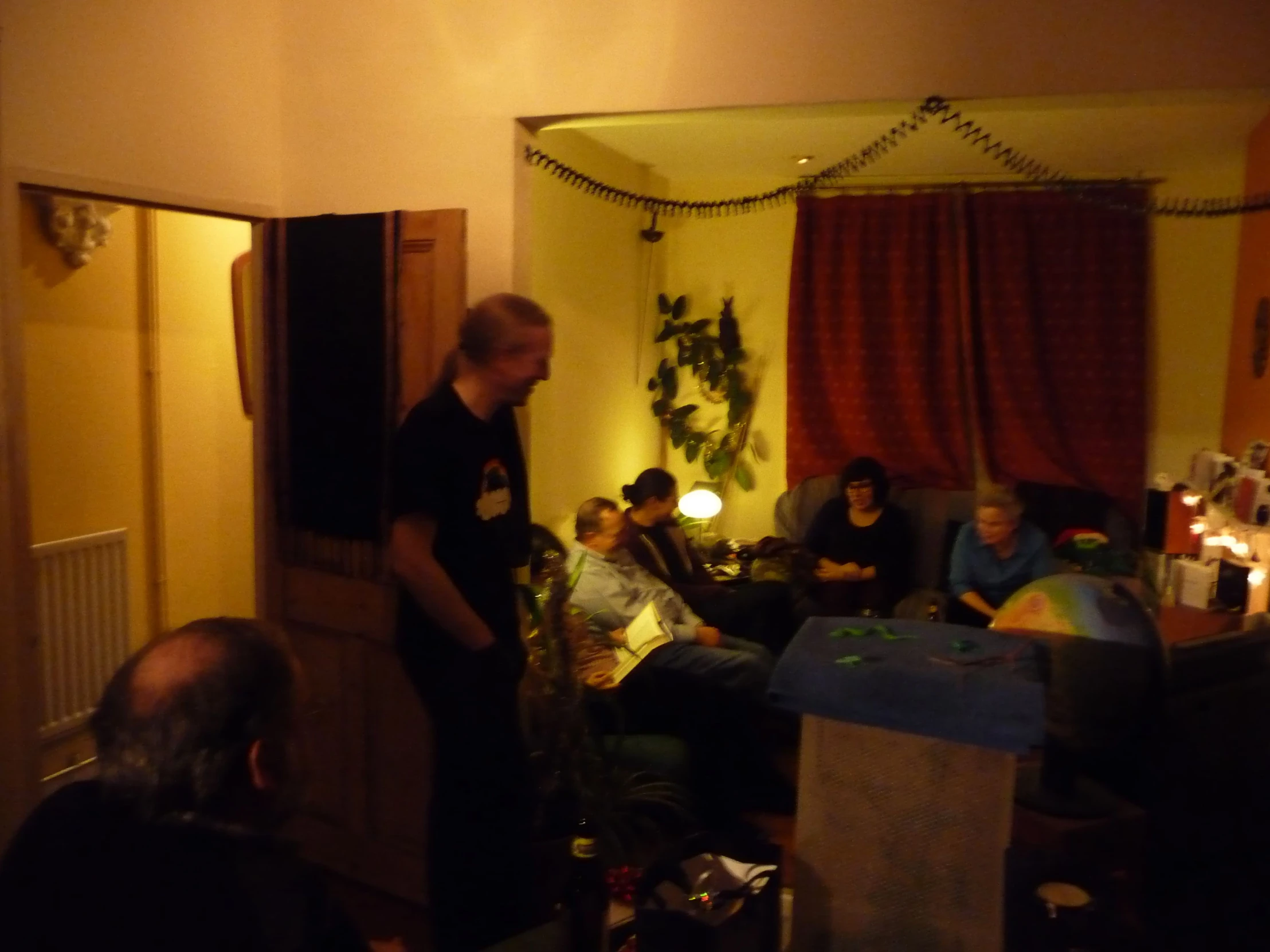 there is an image of a group of people in the living room