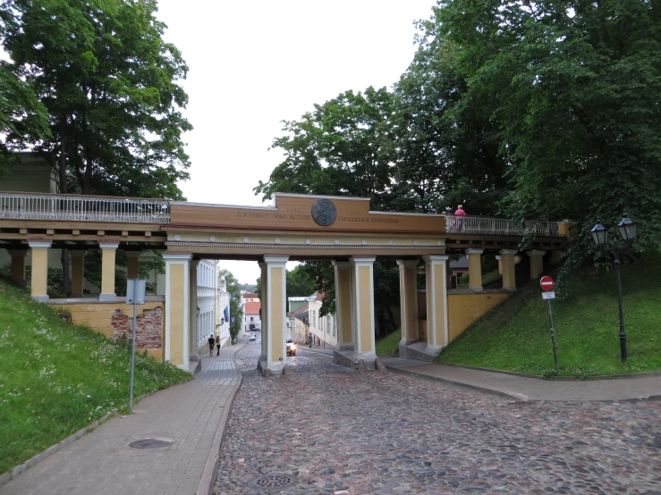 a road passes under an overpass in a city