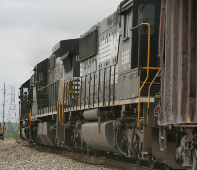 a train is sitting on some train tracks