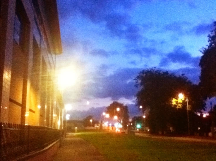 a street light with trees in the background