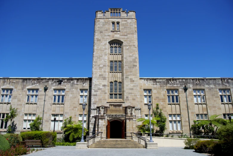 an old stone building with a clock tower