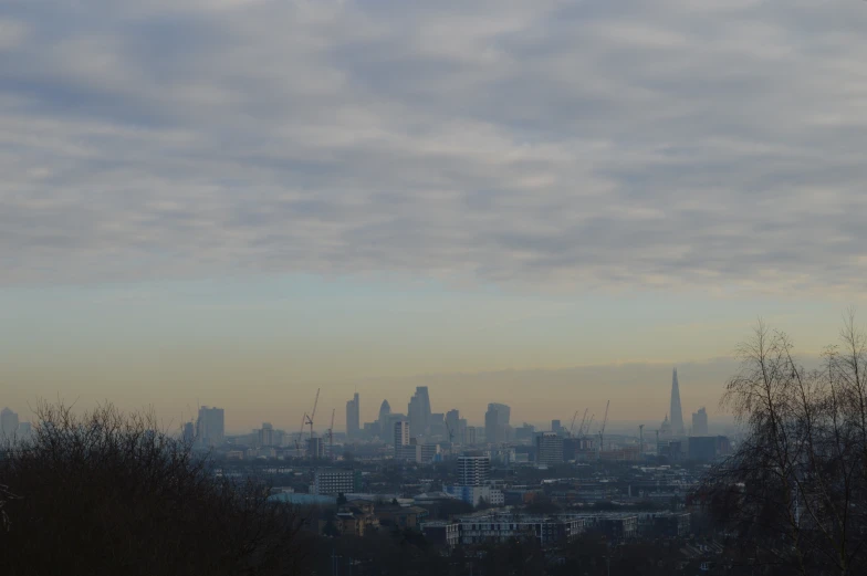 view from the top of a hill in london overlooking city