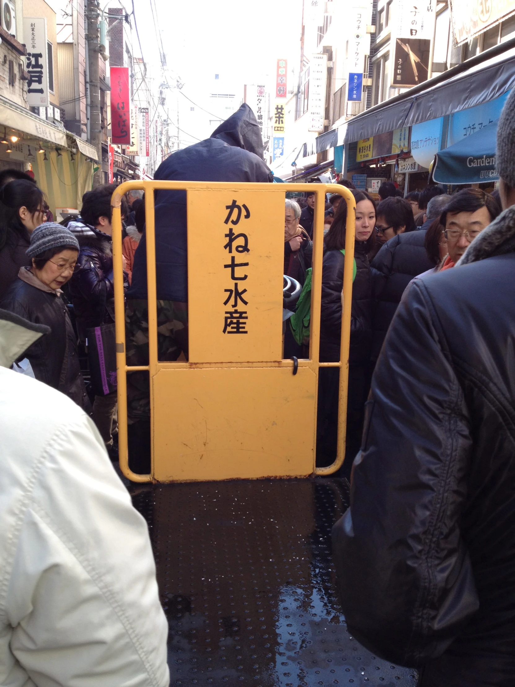 a large bus filled with passengers in a busy city area