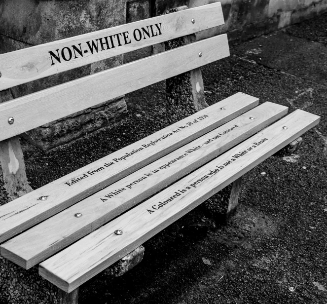 the bench has a poem painted on it