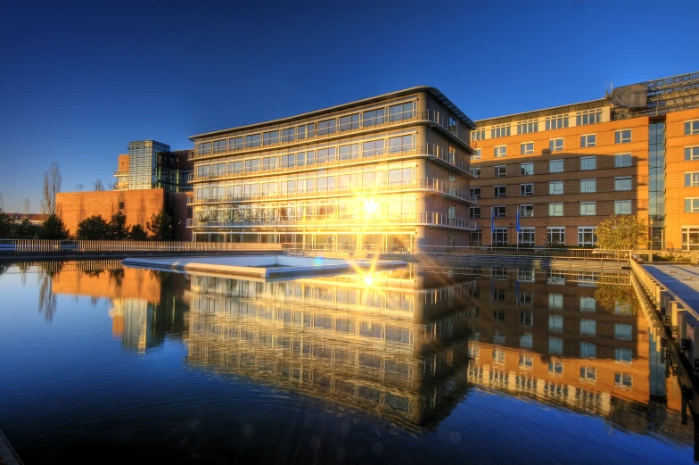 building that has reflecting in the water