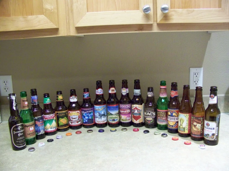 a number of beer bottles on a counter